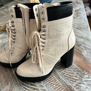 Vince Camuto heeled snake skin combat boots